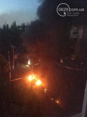 In the center of Mariupol buses are burning: the military unit can hear shots, helicopters are landing at the airport. PHOTO reportage