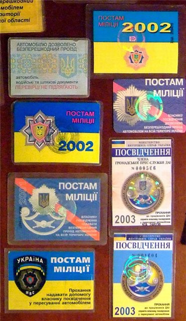 Crossroads, coupons, permits, business cards, police stations
