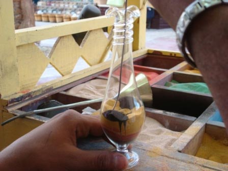 Decoration of bottles with sand