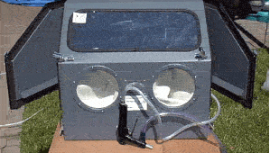 Sand blasting chamber.